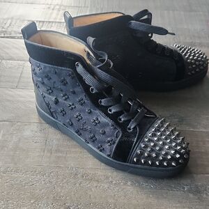 This is a pair of Christian Louboutin Lou Spikes Orlat